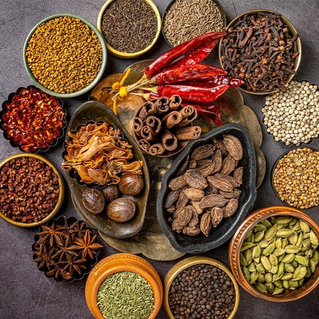 Sun-dried whole turmeric, cardamom, and spice condiments